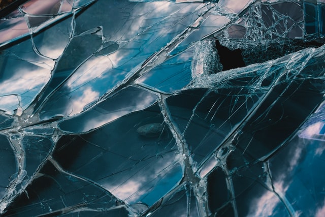 a sheet of broken one-way bullet-resistant glass