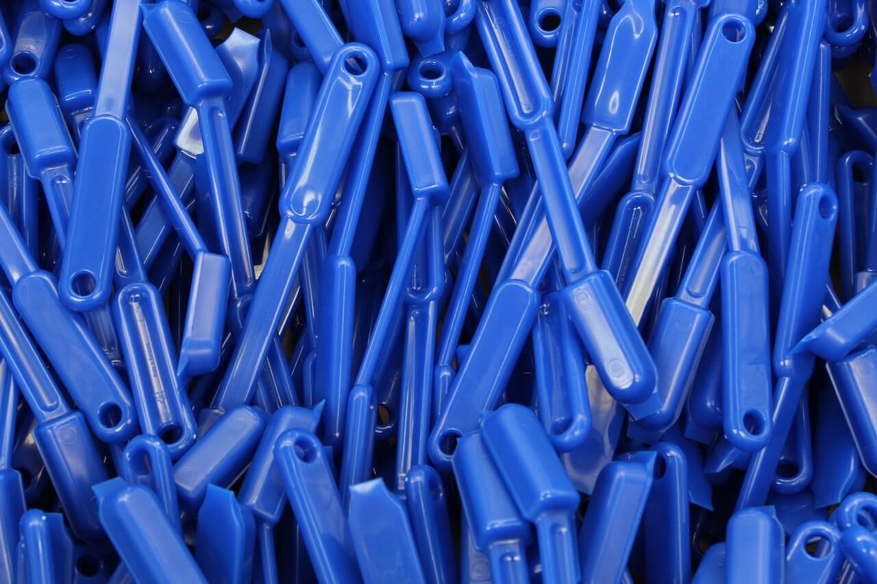 small blue plastic pieces