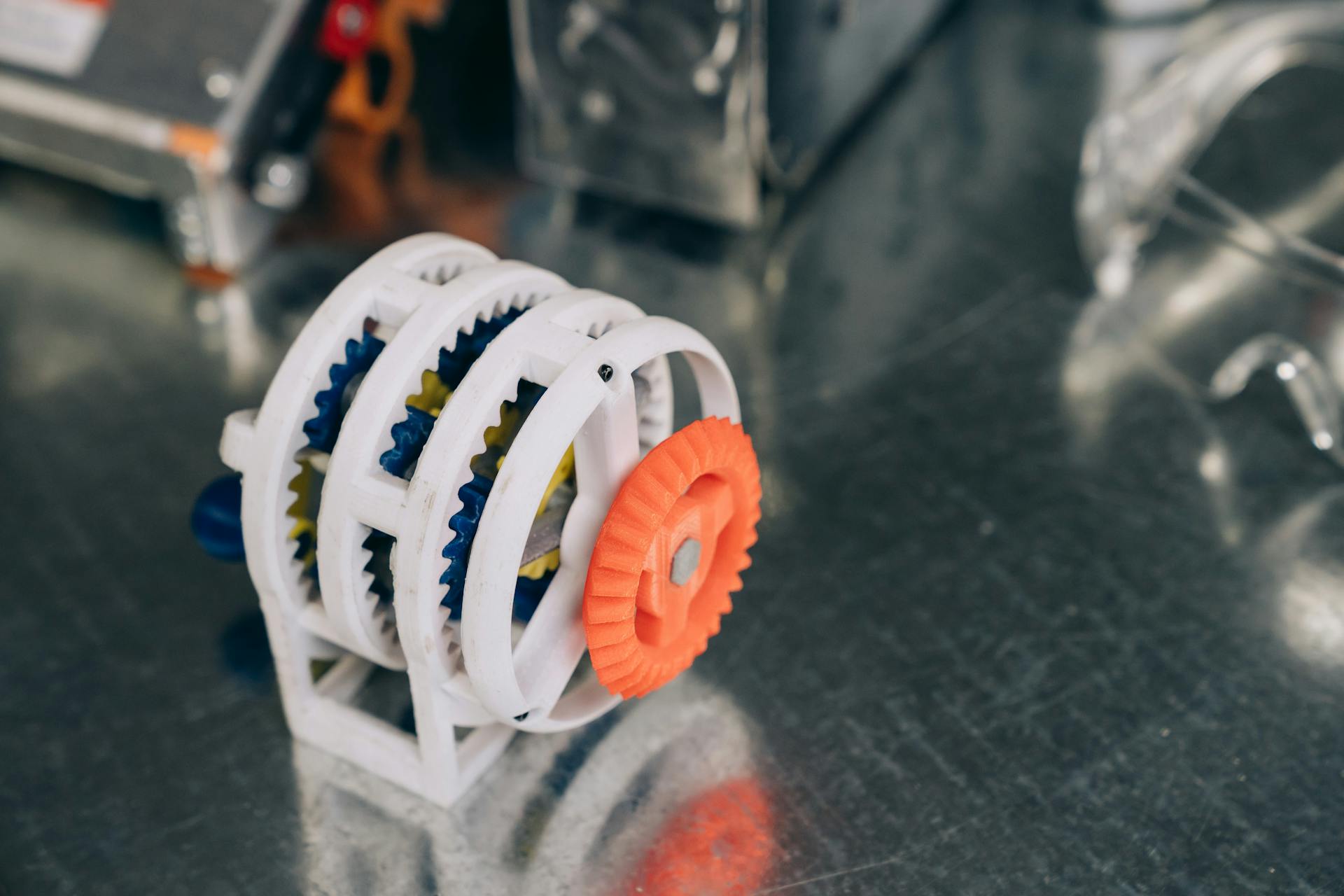 Close-up of a 3D-printed classic gear assembly with interlocking components.